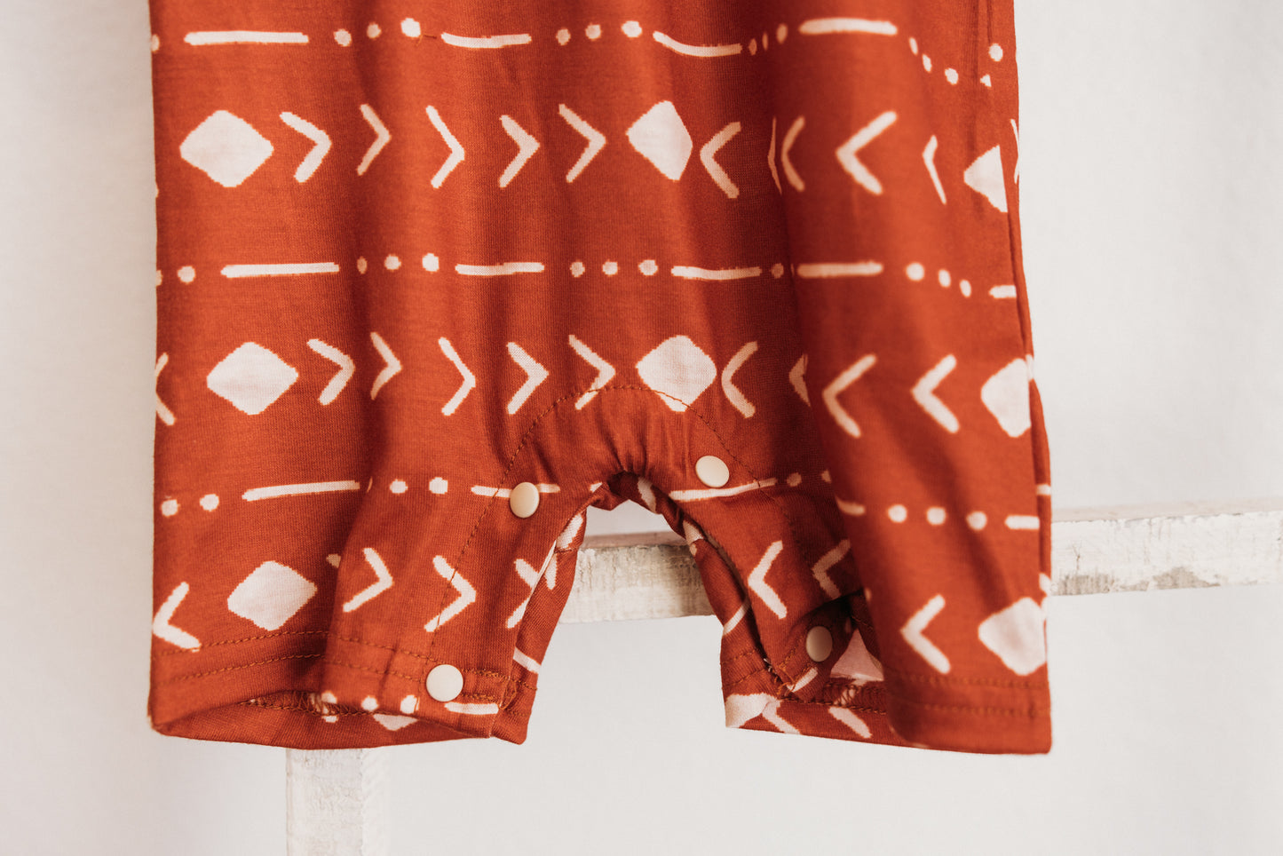Patterened Short Sleeve Snap Romper Rust
