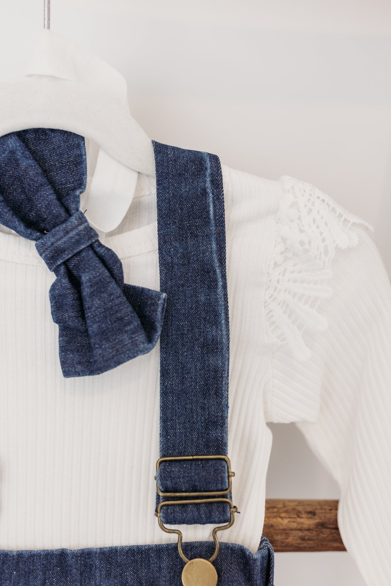 Suspender Skirt & Ruffle Long Sleeve Top with Bow | Denim/White