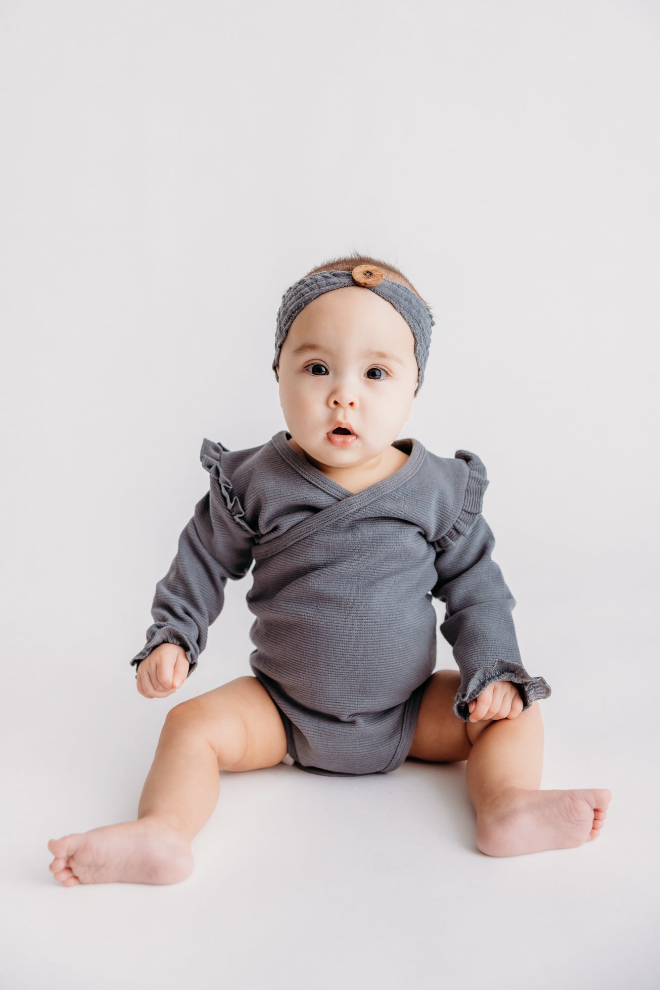 Corduroy Ruffle Wrap Bodysuit in Moonstone
